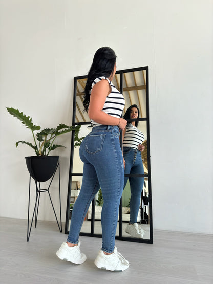 Jean skinny tono medio tiro alto 5 Botones