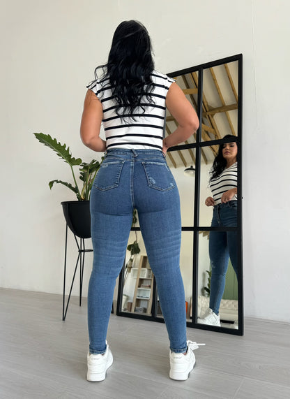 Jean skinny tono medio tiro alto 5 Botones